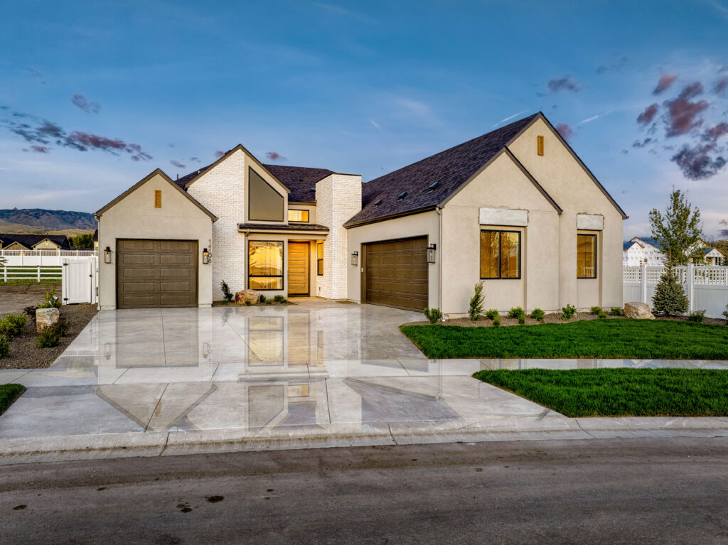 Gorgeous new home with dual garage and sleek landscaping